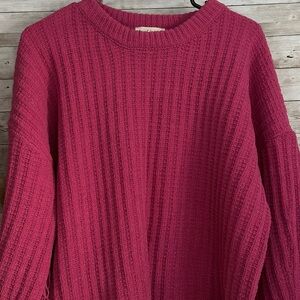 Fun, cropped fuchsia sweater with fringe.
